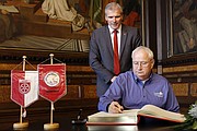 While in Erfurt, Johnson County Commissioner Jim Allen signs the city’s golden book, which has also been signed by Pope Benedict XVI and the Dalai Lama.