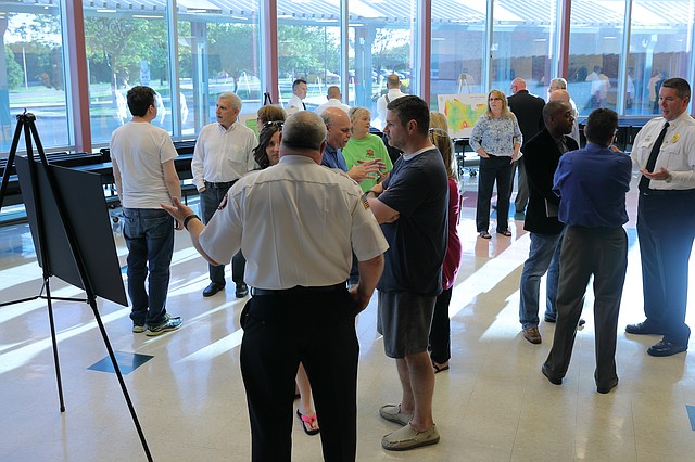 Dozens of residents showed up to a meeting at Riverview Elementary School last week to view preliminary plans for the location of a new fire station to be built in northwestern Shawnee.
