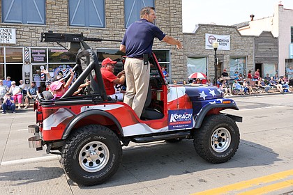 Kansas Secretary of State Kris Kobach rides in the Old Shawnee Days parade on June 2.