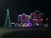 Tim and Teresa Burge's house at Rawlings and Joles drives in Tonganoxie has a slew of attractions, all set to music.