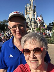 Paula and Steve Gish, Tonganoxie, are at the parade Feb. 3 at Walt Disney World in Orlando, Fla., for Patrick Mahomes. The couple was visiting family during a trip planned well before the Chiefs made their playoff run toward their Super Bowl chmampionship in Miami.