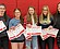 Tonganoxie High volleyball players display their postseason accolades. Pictured, from left, are ...