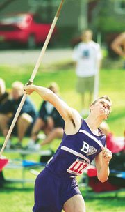 Baldwin High School's Eric Brown lets fly with the javelin during
competition at the KU Relays Friday. Brown won the event with a
heave of just over 198 feet.