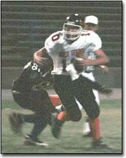 Bonner Springs quarterback Tommy Gardner attempted to elude a
Washington defender during football action Friday at Washington.
Gardner broke free, but was unable to complete his pass on the
play. The Braves dropped the game 30-6.
