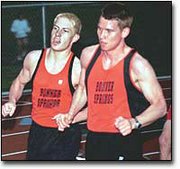 Bonner springs sophomore Steve Lutjen, left, and senior Brock
Peterson both make the turn in the 1600-meter run on Friday.