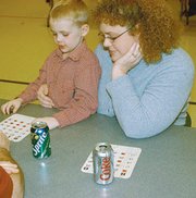 Weston Trefz, 5, and his mother, Tammie Trefz, enjoyed a night of
bingo, Saturday. The event was sponsored by the Eudora PTO.