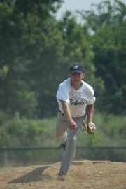 Midwest Rebels pitcher Joe Kaup throws from the mound in weekend
tournament action in Ottawa. The Rebels scored 32 runs during the
three-day tournament, which was good enough for a 3-1 record and a
second-place finish.
