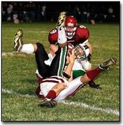 Eudora defensive players take a tumble as they bring down a Prairie
View runner. Next up for the Cardinals is their Homecoming Game
against Baldwin Friday night.