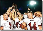 Eudora High football team members celebrates their 27-6 victory
over Basehor and winning a Kansas class 4A bi-district title. The
win also assured the Cardinals a spot in the state quarterfinals.