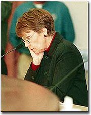Johnson County Commissioner Susie Wolf gives great consideration to
her vote before the commission's meeting on the current Oz
proposal. The commission deadlocked on the plan once again at last
Thursday's meeting.