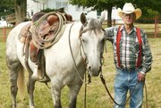 John Smith has spent nearly half his life living and working on
Tailgate Ranch. For Smith, cowboying is about the only way of life
he has ever known.