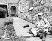 Francis Wiley relaxes at the back of the house near Reno that Nick
Marel built for his parents in the 1940s.