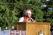 Janelle McCoy challenged her fellow classmates to taste everything
on life's plate, and, while traveling through life, to remember to
return to Tonganoxie.
