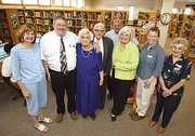 The Tonganoxie City Library was dedicated to Winnie Turner
Saturday. Turner served as librarian from February 1969 to May 1995
and was instrumental in the planning of the current library. From
left are family members and library representatives: Sandy Turner,
Jim Morey, Winnie Turner, Robert Turner, Bobby Turner, Karen Pence,
Sharon Moreland and Betty Nelson.