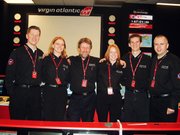 Nancy Milleret, fourth from left, poses with the other three pilots
from KSU and Kevin Stass and Ian Craft, who were the the mission
controllers the students worked with and learned from.