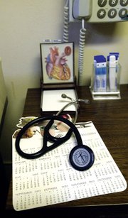 A corner of a desk in one of the examining rooms in Dr. Philip
Stevens' office. Stevens' abilities to diagnose are well-known
among his patients.