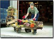 Steve LaForge, co-owner of the Flower Depot, arranges dried
bouquets at the company's new building in Tonganoxie's Urban Hess
Business Center. The homegrown company has seen tremendous growth
since its start 11 years ago.