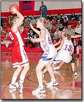 Aimee Eisman looks to pass the ball in a game at Santa Fe Trail
High School Friday night. The Lady Chieftains had an early lead in
the game but were unable to win losing by two points.