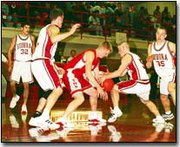 Breuer and a Eudora player battle for the basketball in Friday's
game. Eudora won the eight-team tournament.