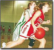 Alicia Stauch dribbles past a DeSoto defender Friday night. Stauch
has stolen at least five passes in each of the last two games.