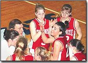 The Chieftains gather for one final huddle in the closing seconds
of their second-round, Sub-State victory over top-seeded Jefferson
West. The time out was called following an Andrea Korb free throw
that put the Chieftains up by four and out of Jeff West's reach.