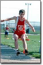 Courtney King sticks his jump Friday at Eudora. The field events
accounted for 17 of the boy's 30 medals at the meet.